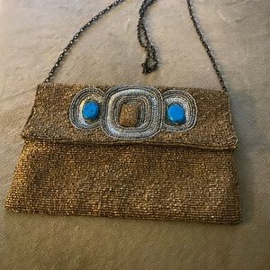 Sequin crossbody purse with attached stones. Never used